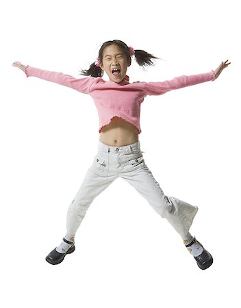 screaming little girl - Girl jumping with her arms outstretched Stock Photo - Premium Royalty-Free, Code: 640-01356716