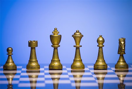 simsearch:640-01351370,k - Close-up of chess pieces on a chessboard Stock Photo - Premium Royalty-Free, Code: 640-01356800