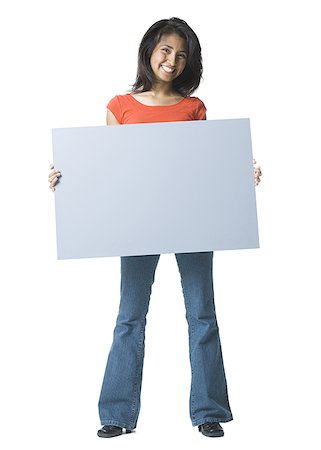 simsearch:640-01365908,k - Portrait of a young woman holding a blank sign Foto de stock - Royalty Free Premium, Número: 640-01356950