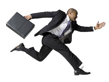 people running with briefcases - Businessman running Stock Photo - Premium Royalty-Free, Code: 640-01357209