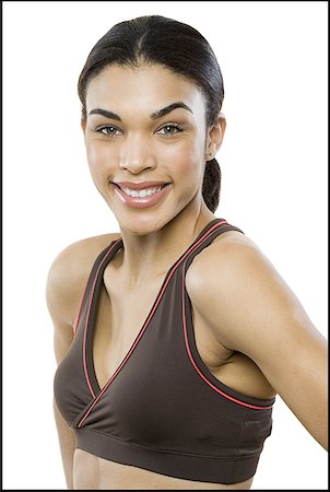 ponytail white background not full body - Portrait of a young woman smiling Stock Photo - Premium Royalty-Free, Code: 640-01357224