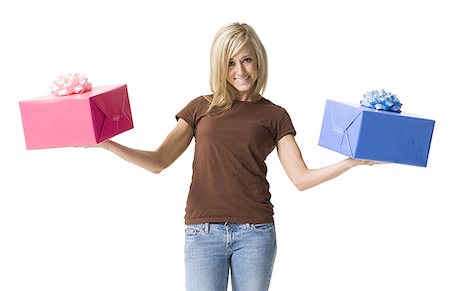 simsearch:640-01356220,k - Portrait d'une jeune femme tenant deux cadeaux Photographie de stock - Premium Libres de Droits, Code: 640-01357299