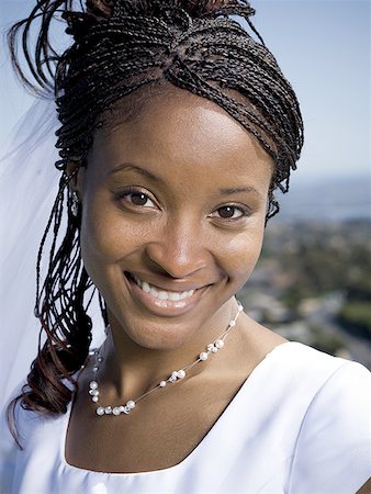 Portrait of a bride smiling Stock Photo - Premium Royalty-Free, Code: 640-01357293