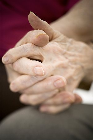 Close-up of a senior couple's hands Stock Photo - Premium Royalty-Free, Code: 640-01357344