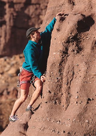 simsearch:640-01349855,k - Man rock climbing Foto de stock - Sin royalties Premium, Código: 640-01357340
