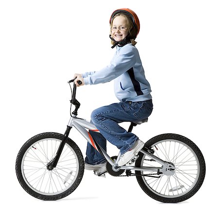 simsearch:695-05779541,k - Portrait of a girl riding a bicycle Stock Photo - Premium Royalty-Free, Code: 640-01357343