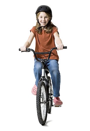 simsearch:640-01364664,k - Portrait of a girl riding a bicycle Foto de stock - Sin royalties Premium, Código: 640-01357421