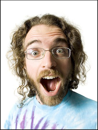 portrait hippies - Surprised man with long hair and beard Stock Photo - Premium Royalty-Free, Code: 640-01357471