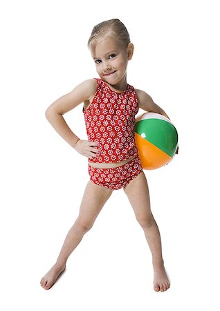 Young girl with beach ball Stock Photo - Premium Royalty-Free, Code: 640-01357492