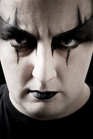 eyeliner - Close-up of man with black and white makeup Foto de stock - Sin royalties Premium, Código: 640-01357612