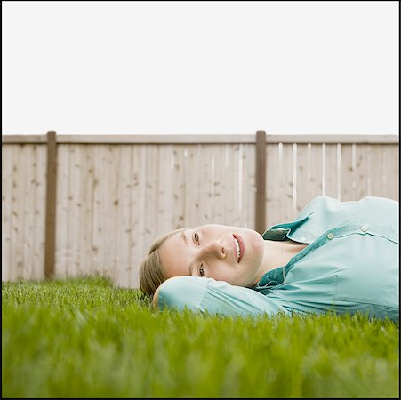 High angle view of a young woman day dreaming Stock Photo - Premium Royalty-Free, Code: 640-01357699