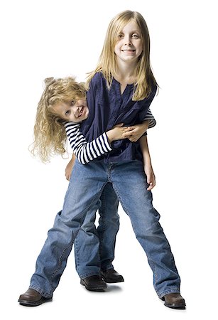 simsearch:640-01601334,k - Two girls playing together Stock Photo - Premium Royalty-Free, Code: 640-01357786