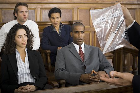 Lawyer presenting evidence to jurors Stock Photo - Premium Royalty-Free, Code: 640-01357986