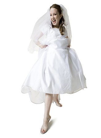 simsearch:640-01362473,k - Portrait of a bride showing her sandals Foto de stock - Sin royalties Premium, Código: 640-01358242