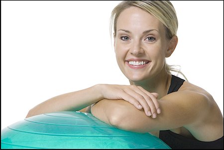 simsearch:640-01355937,k - Portrait of a young woman leaning on a fitness ball Foto de stock - Sin royalties Premium, Código: 640-01358462