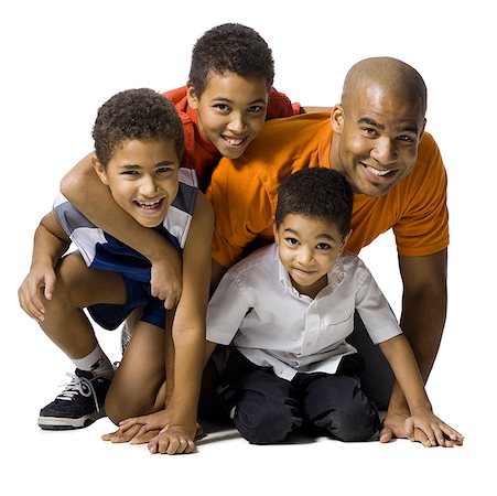 simsearch:640-02770419,k - Father posing with three sons Stock Photo - Premium Royalty-Free, Code: 640-01358540
