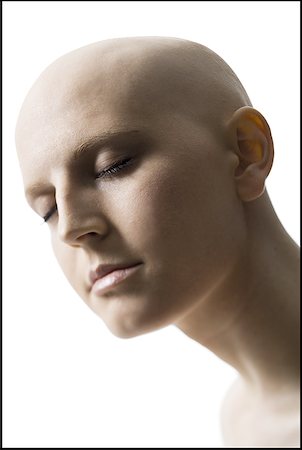 single bald women - Close-up of a young woman Stock Photo - Premium Royalty-Free, Code: 640-01358975