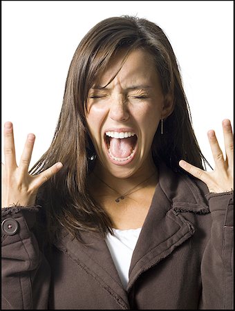 screaming woman in fear - Screaming and excited young woman Stock Photo - Premium Royalty-Free, Code: 640-01359052