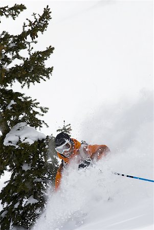 simsearch:640-01362181,k - Downhill skier skiing on mountain Foto de stock - Sin royalties Premium, Código: 640-01359208