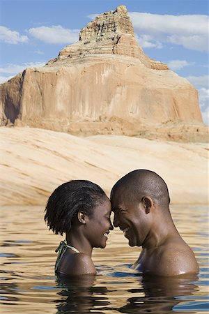 simsearch:640-01350948,k - Profile of a young couple standing in a lake Stock Photo - Premium Royalty-Free, Code: 640-01359257