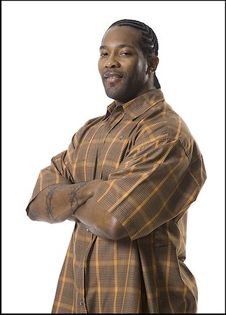African American man with arms folded Stock Photo - Premium Royalty-Free, Code: 640-01359324