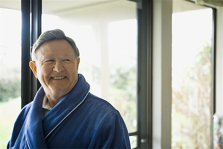 elderly face - Portrait of a senior man smiling Stock Photo - Premium Royalty-Free, Code: 640-01359425