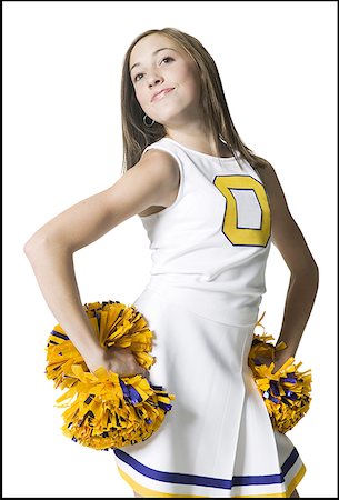 Cheerleader holding pom-poms Stock Photo - Premium Royalty-Free, Code: 640-01359430