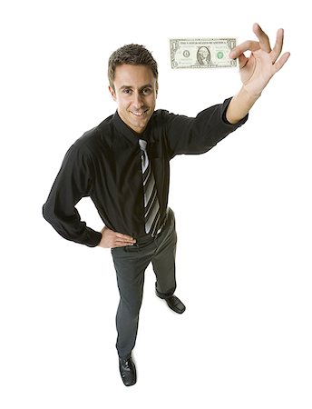 simsearch:640-02767744,k - High angle view of a businessman holding an American dollar bill Foto de stock - Sin royalties Premium, Código: 640-01359489