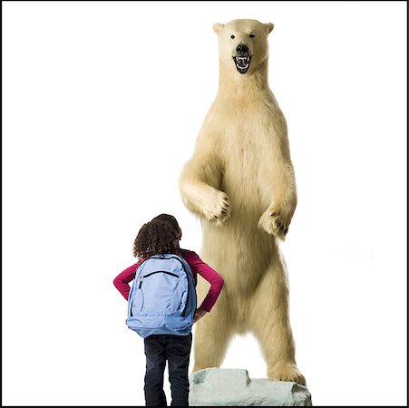 Rear view of girl with polar bear Stock Photo - Premium Royalty-Free, Code: 640-01359667