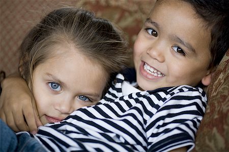 simsearch:693-06403573,k - Portrait of a boy and girl lying together Stock Photo - Premium Royalty-Free, Code: 640-01359815