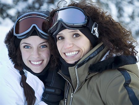 ski goggles mature not senior - Two women outdoors in winter with ski goggles smiling Stock Photo - Premium Royalty-Free, Code: 640-01359848