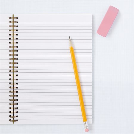 pencils and eraser - Spiral notebook with pencil and eraser Stock Photo - Premium Royalty-Free, Code: 640-01350043