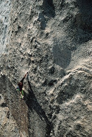 simsearch:640-01349855,k - High angle view of a person rock climbing Foto de stock - Sin royalties Premium, Código: 640-01350113