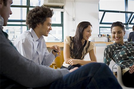 funny office chairs pictures - Four people talking in an office Stock Photo - Premium Royalty-Free, Code: 640-01350120