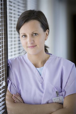 simsearch:628-01639098,k - Portrait of a female nurse smiling Stock Photo - Premium Royalty-Free, Code: 640-01350259