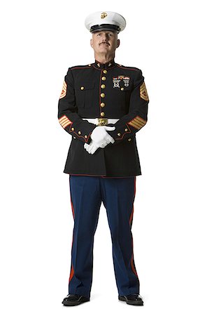full length senior on white background - Portrait of a man in a military uniform Stock Photo - Premium Royalty-Free, Code: 640-01350287