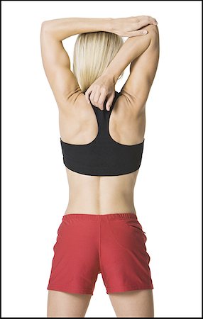 simsearch:640-01355937,k - Rear view of a young woman exercising Foto de stock - Sin royalties Premium, Código: 640-01350282