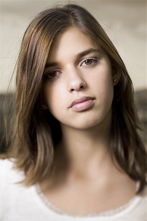 simsearch:640-01354447,k - Portrait of a young woman thinking Stock Photo - Premium Royalty-Free, Code: 640-01350395
