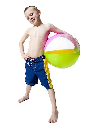simsearch:640-01363754,k - Portrait d'un garçon tenant un ballon de plage Photographie de stock - Premium Libres de Droits, Code: 640-01350429