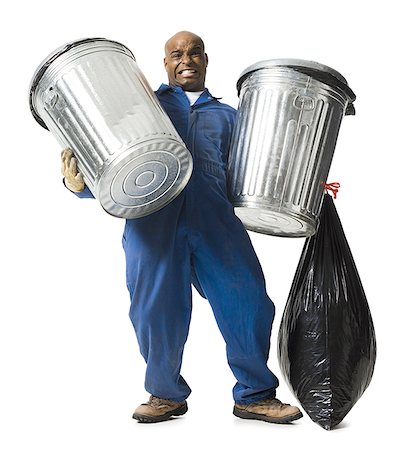Garbage man with trash cans Stock Photo - Premium Royalty-Free, Code: 640-01350440