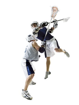 simsearch:625-00838657,k - Two young men playing lacrosse Stock Photo - Premium Royalty-Free, Code: 640-01350717