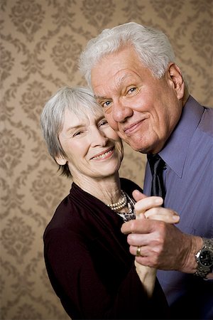 Portrait of an elderly couple dancing Foto de stock - Sin royalties Premium, Código: 640-01350803