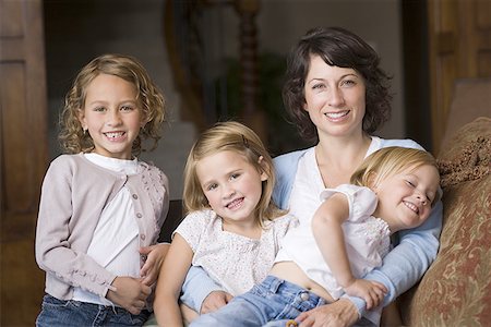 Portrait of a mother with her three daughters Stock Photo - Premium Royalty-Free, Code: 640-01350826