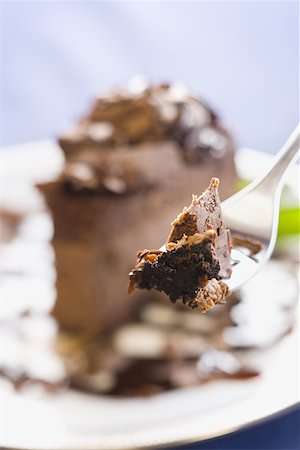 simsearch:824-07310346,k - Close-up of chocolate cake on a fork Foto de stock - Sin royalties Premium, Código: 640-01350835