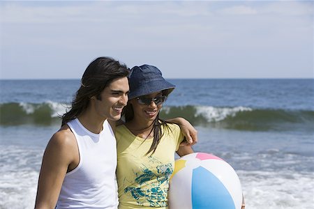 Young couple walking on the beach Stock Photo - Premium Royalty-Free, Code: 640-01351005