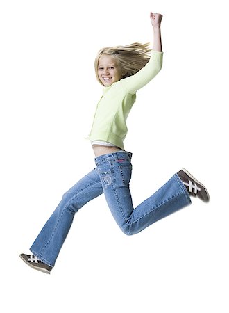 simsearch:640-03257317,k - Profile of a girl jumping in mid- air Fotografie stock - Premium Royalty-Free, Codice: 640-01351131
