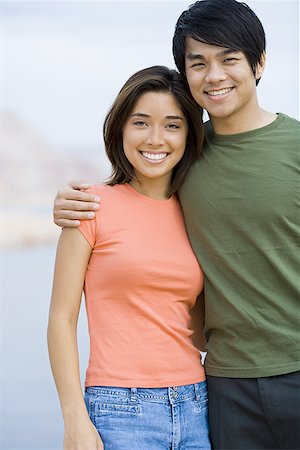 Portrait of a young couple smiling Stock Photo - Premium Royalty-Free, Code: 640-01351286