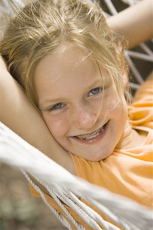 simsearch:640-01348953,k - Portrait of a girl lying in a hammock Stock Photo - Premium Royalty-Free, Code: 640-01351417