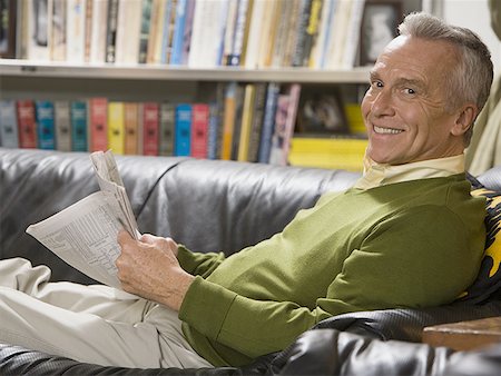 simsearch:640-01358246,k - Portrait of a mature man sitting on a couch and smiling Stock Photo - Premium Royalty-Free, Code: 640-01351475