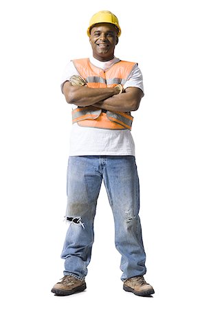 simsearch:640-02770178,k - Male road worker with crossed arms and hardhat smiling Foto de stock - Royalty Free Premium, Número: 640-01351501